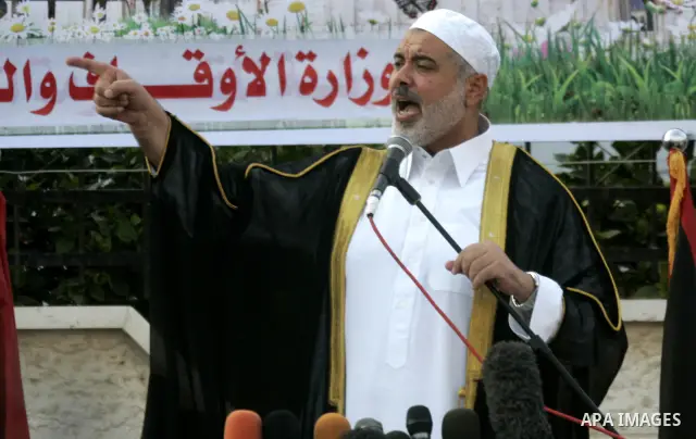 Ismail Haniya, Palestinian Prime Minister in the Gaza Strip, addresses the public during an open air morning prayer to celebrate Eid al-Fitr in Khan Yunis town the southern Gaza Strip on August 30, 2011. The Palestinian...