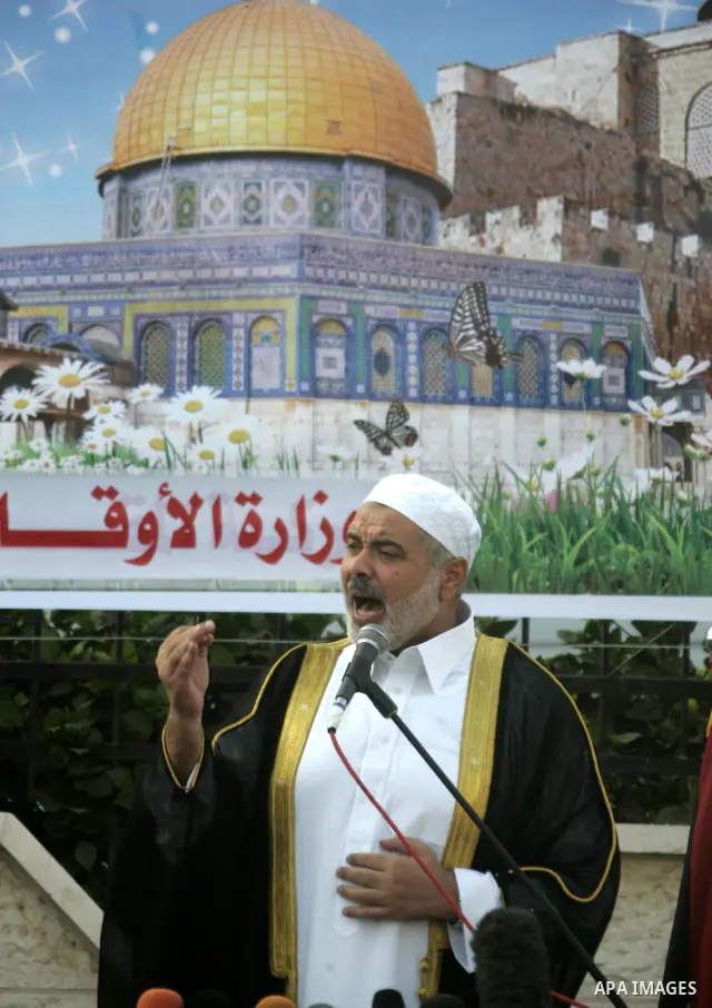 Ismail Haniya, Palestinian Prime Minister in the Gaza Strip, addresses the public during an open air morning prayer to celebrate Eid al-Fitr in Khan Yunis town the southern Gaza Strip on August 30, 2011. The Palestinian...
