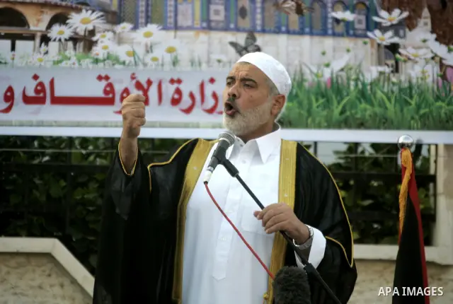 Ismail Haniya, Palestinian Prime Minister in the Gaza Strip, addresses the public during an open air morning prayer to celebrate Eid al-Fitr in Khan Yunis town the southern Gaza Strip on August 30, 2011. The Palestinian...