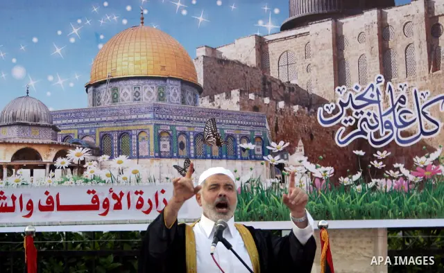 Ismail Haniya, Palestinian Prime Minister in the Gaza Strip, addresses the public during an open air morning prayer to celebrate Eid al-Fitr in Khan Yunis town the southern Gaza Strip on August 30, 2011. The Palestinian...
