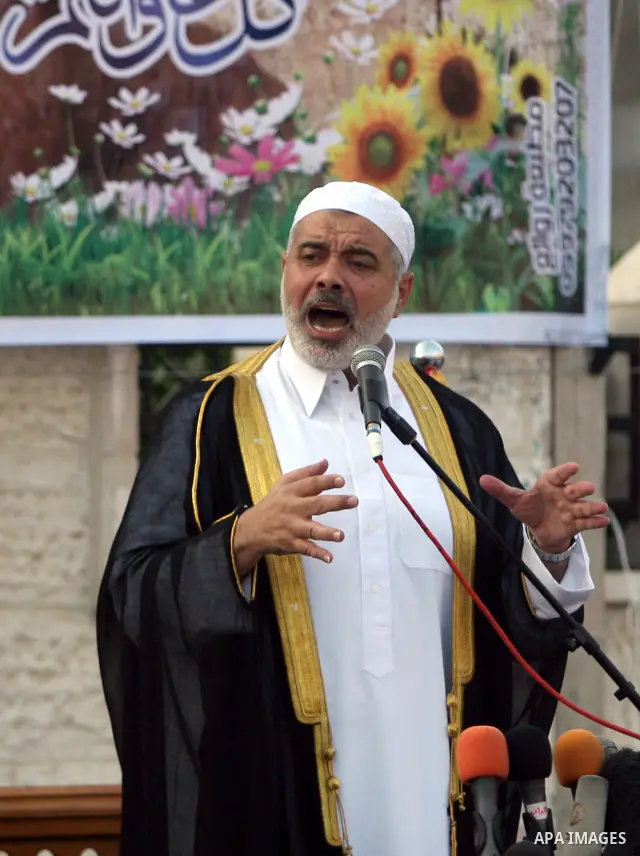Ismail Haniya, Palestinian Prime Minister in the Gaza Strip, addresses the public during an open air morning prayer to celebrate Eid al-Fitr in Khan Yunis town the southern Gaza Strip on August 30, 2011. The Palestinian...