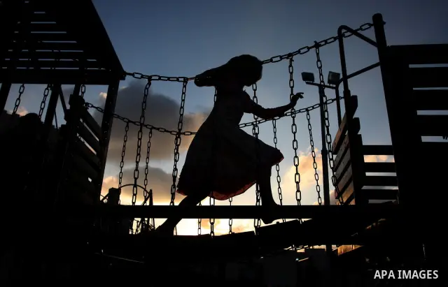 Palestinian children enjoy a ride at an amusement park on the second day of the Eid al-Fitr holiday, which marks the end of the holy fasting month of Ramadan, in the West Bank city of Ramallah, 31 August 2011. Photo by I...