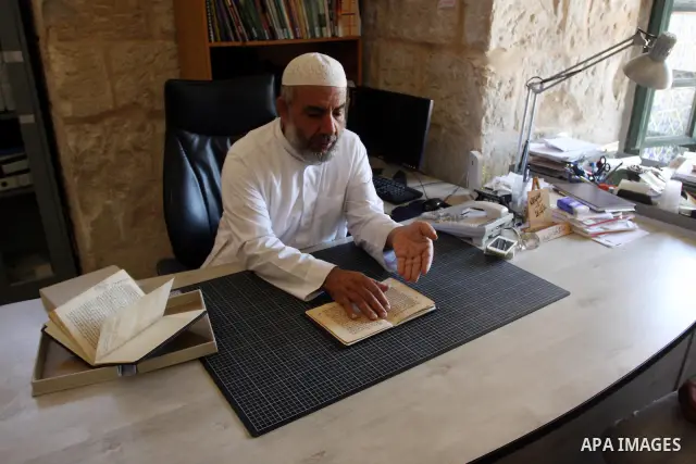 Palestinians work to rewrite manuscripts in the Manuscript Center at Al-Aqsa Mosque in Jerusalem on September 2, 2011 .The Manuscript Center Aqsa Mosque first of its kind in the Middle East and fourth in the world, as cl...