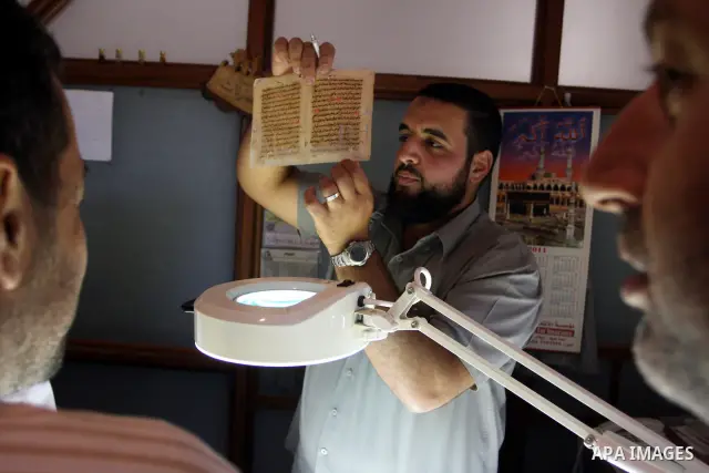 Palestinians work to rewrite manuscripts in the Manuscript Center at Al-Aqsa Mosque in Jerusalem on September 2, 2011 .The Manuscript Center Aqsa Mosque first of its kind in the Middle East and fourth in the world, as cl...