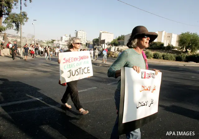Israeli, Palestinian and foreign activists take part in a weekly demonstration against Israel's occupation of Palestinian land on Sept. 2, 2011 in the mostly Arab Jerusalem neighborhood of Sheikh Jarrah. Photo by Mahfouz...