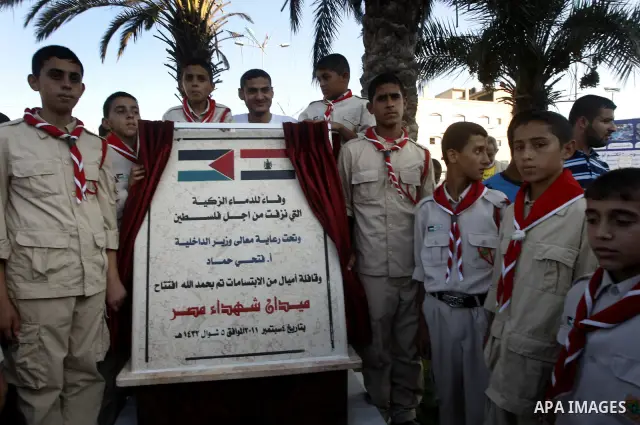 Members of Palestinian scouts, members of ''Miles of Smiles" convoy and other pro-Palestinian activists attend the inauguration ceremony of the memorial for Egyptian soldiers who killed by Israeli army on the border betw...