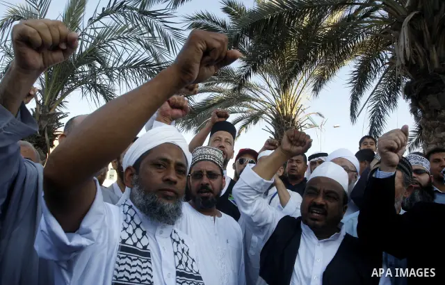 Members of ''Miles of Smiles" convoy and other pro-Palestinian activists attend the inauguration ceremony of the memorial for Egyptian soldiers who killed by Israeli army on the border between Israel and Egypt's Sinai Pe...