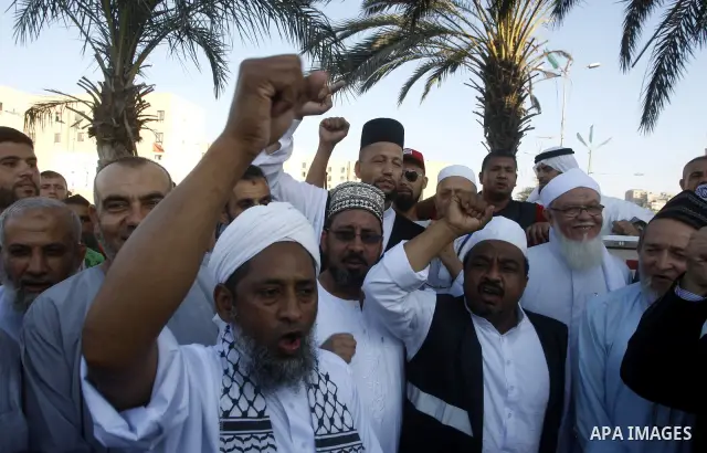 Members of ''Miles of Smiles" convoy and other pro-Palestinian activists attend the inauguration ceremony of the memorial for Egyptian soldiers who killed by Israeli army on the border between Israel and Egypt's Sinai Pe...