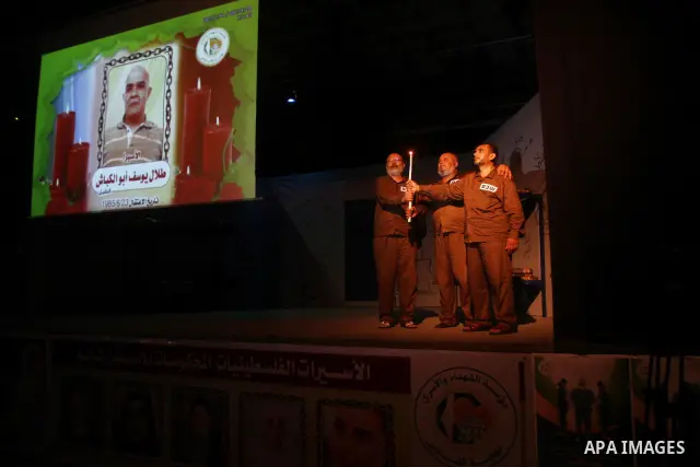 Palestinian actors perform at al-Shawwa theatre a play appear the hard life of Palestinian prisoners inside the Israeli jails, in Gaza city on Sep 3,2011. About 7,500 Palestinian prisoners are held in Israeli jails, acco...