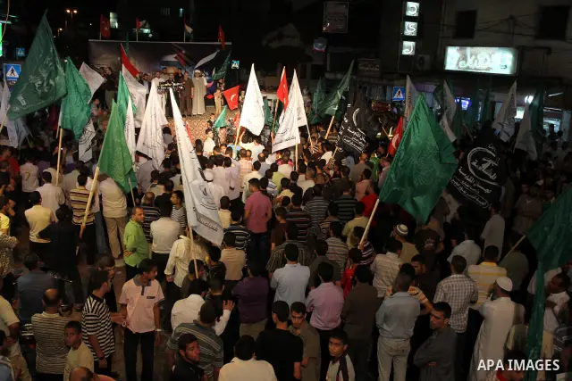 Palestinians wave with their national flag and Turkish flag during a rally in support to Turkish decision in Gaza city on Sep. 3,2011. Turkey said Friday it was expelling the Israeli ambassador and cutting military ties...