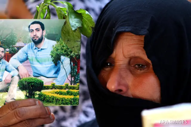 Palestinian women hold pictures of their prisoned relatives in Israeli jails as they gather in a weekly activity calling for their liberty at the Red Cross headquarters in Gaza City onSep. 5, 2011. About 7000 prisoners a...