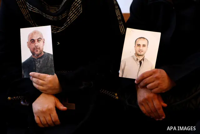 Palestinian women hold pictures of their prisoned relatives in Israeli jails as they gather in a weekly activity calling for their liberty at the Red Cross headquarters in Gaza City onSep. 5, 2011. About 7000 prisoners a...
