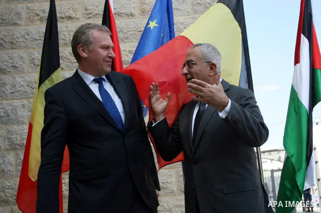 Palestinian Prime Minister Salam Fayyad welcomes his Belgian counterpart, Yves Leterme prior to a meeting in the West Bank town of Ramallah, on 05 September 2011, a day after Palestinian officials insisted they would not...