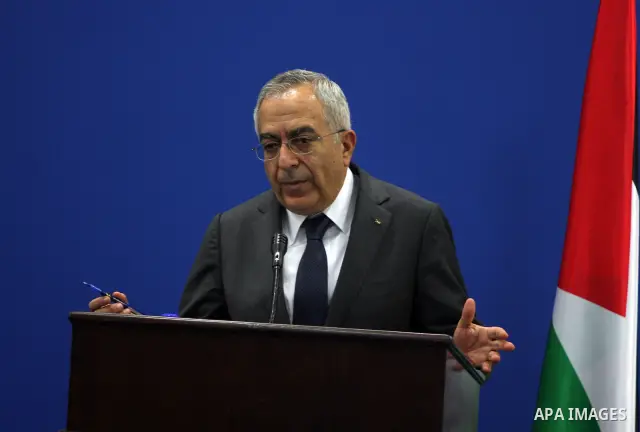 Palestinian Prime Minister Salam Fayyad and his Belgian counterpart, Yves Leterme (not seen) speak to the media following their meeting in the West Bank town of Ramallah, on 05 September 2011, a day after Palestinian off...