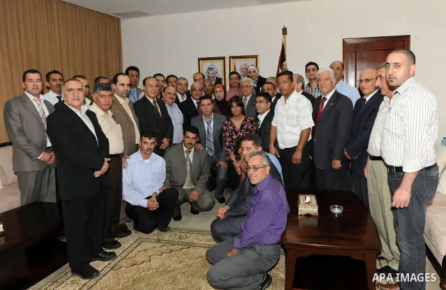 Palestinian President Mahmoud Abbas (Abu Mazen) meets with the Palestinian medical delegation heading to Libya, in the West Bank city of Ramallah, on Sep. 6, 2011. Photo by Mufeed Abu Hasnah
