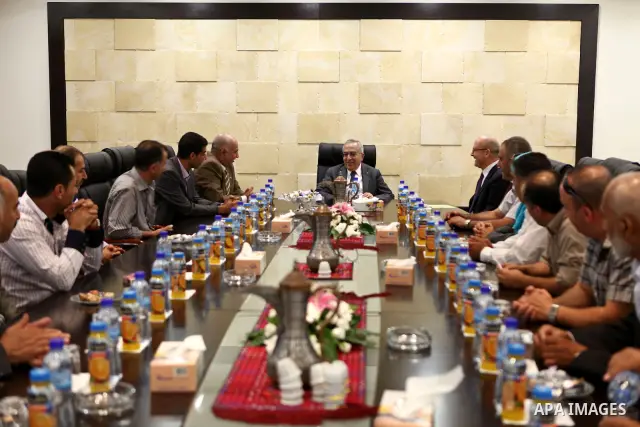 Palestinian Prime Minister, Salam Fayyad receives economic and legal, social and civil figures, in the province of Jenin in the West Bank on Sep. 6, 2011. Photo by Mustafa Abu Dayeh