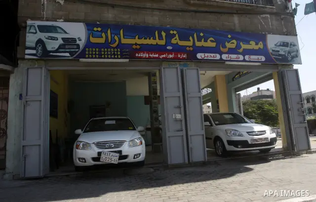 Cars are displayed at a showroom in Gaza City on Sep. 7, 2011. while Israel stop to enter cars into Gaza Strip again after it allowed to enter them as a part of a new strategy to increase Gaza blockade. Photo by Mahmud N...