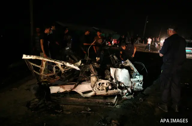 Palestinians check the damage to a car after an Israeli attack in Deir al-Balah in the central Gaza Strip on September 7, 2011. The hardline Islamic Jihad group said that the dead man, Remah al-Hasani, was a member of it...