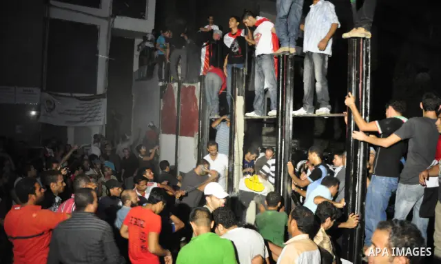 Egyptian protesters dismantle the concrete wall which was built in front of the Israeli embassy, in Cairo, Egypt, 09 September 2011. Security forces had built the wall in an attempt to secure the embassy after a series o...