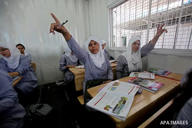Palestinian students crammed in the schools of Relief and Works Agency refugees "UNRWA" studying at the "containers" made of tin because of overcrowding and the inability to accommodate large numbers of students in Gaza...