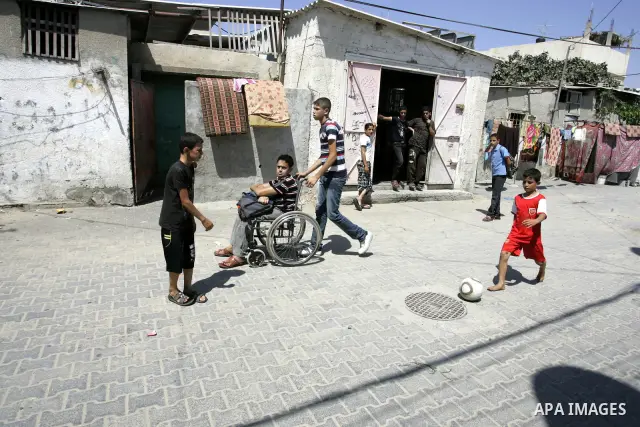 Palestinian children play in the street in the Rafah Refugee Camp, Southern Gaza Strip on September 13, 2011. A diplomatic showdown looms at the United Nations this month when Palestinian President Mahmoud Abbas is expec...