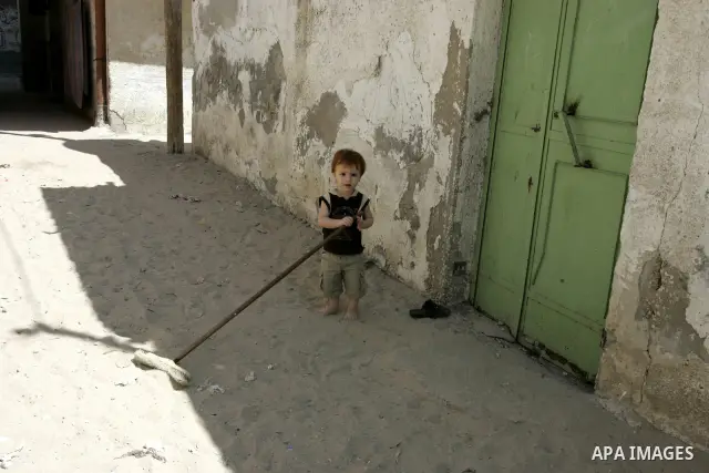 A Palestinian child stands in the street in the Rafah Refugee Camp, Southern Gaza Strip on September 13, 2011. A diplomatic showdown looms at the United Nations this month when Palestinian President Mahmoud Abbas is expe...