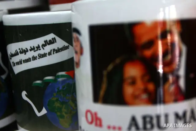 Coffee mugs stand for sale at a souvenirs shop in Gaza City as part of the campaign promoting the Palestinians' bid for statehood on September 14, 2011. The Palestinians are preparing to submit a formal request to become...