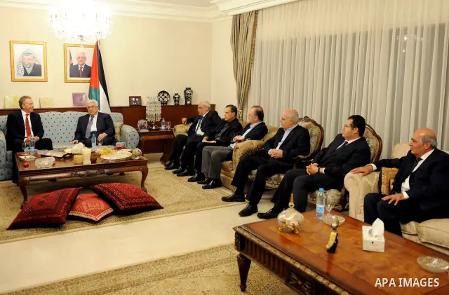 Palestinian Mahmoud Abbas meets with the Quartet envoy to the Middle East, Tony Blair in Jordanian capital of Amman on Sep. 14,2011. Photo by Thaer Ganaim