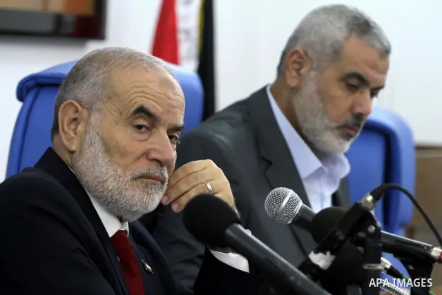 Palestinian Prime Minister in the Gaza Strip, Ismail Haniya during the meeting of the Palestinian Legislative Council members of the mass of change and reform, and a representative of the Hamas parliamentary bloc in Gaza...