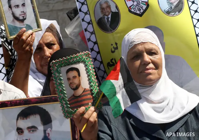Palestinian Journalists and the relatives of prisoners take part during a protest in support with the journalist Samir Allawi, Al-Jazeera correspondent detained by the occupation, and calling for the release of the priso...