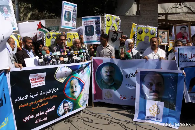 Palestinian Journalists and the relatives of prisoners delivers speech during a protest in support with the journalist Samir Allawi, Al-Jazeera correspondent detained by the occupation, and calling for the release of the...
