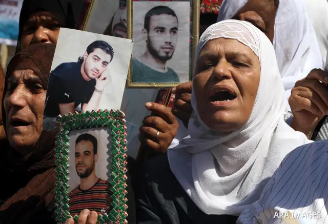 Palestinian Journalists and the relatives of prisoners take part during a protest in support with the journalist Samir Allawi, Al-Jazeera correspondent detained by the occupation, and calling for the release of the priso...