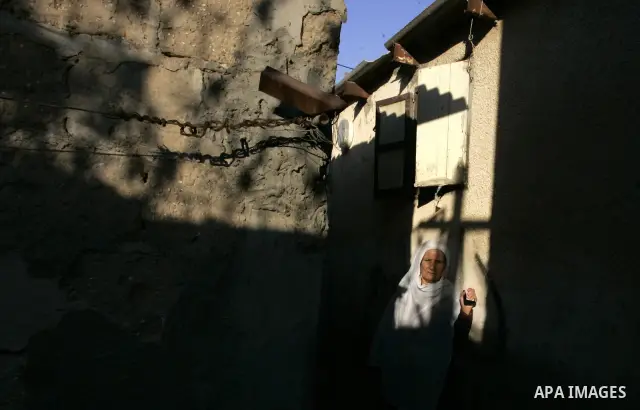 A Palestinian woman stands in the Rafah refugee camp, southern Gaza Strip on Sep. 19, 2011. Attend the 66th General Assembly session of United Nations, which begins Tuesday, Sep. 20. The United States and Europe scramble...