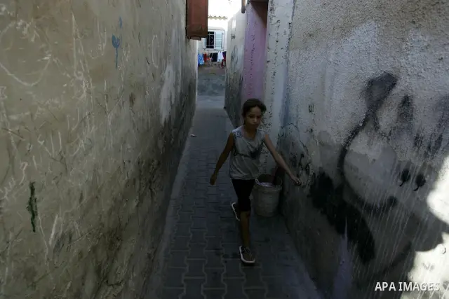 A Palestinian girl walks in the Rafah refugee camp, southern Gaza Strip on Sep. 19, 2011. Attend the 66th General Assembly session of United Nations, which begins Tuesday, Sep. 20. The United States and Europe scrambled...