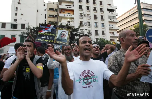 Hundreds of Egyptian activists marched in downtown Cairo to protest against the reassertion of the Emergency Law in the wake of the attack on the Israeli Embassy on 9 September. Egyptian activists marching through the st...