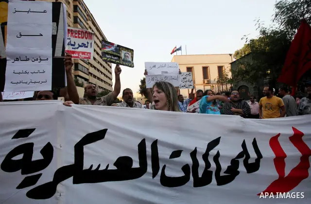 Hundreds of Egyptian activists marched in downtown Cairo to protest against the reassertion of the Emergency Law in the wake of the attack on the Israeli Embassy on 9 September. Egyptian activists marching through the st...