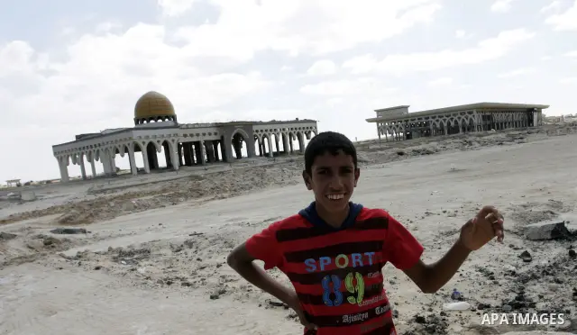 A Palestinian walks the rubble of the Gaza International Airport in Rafah in the southern Gaza Strip, on September 20, 2011. The 70-million-dollar airport which opened in November 1998 has been closed since February 2001...