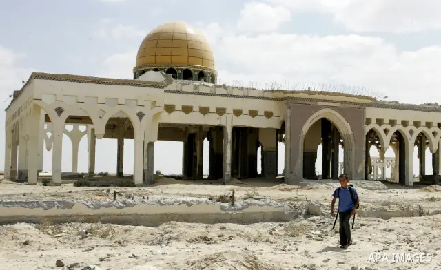 A Palestinian walks the rubble of the Gaza International Airport in Rafah in the southern Gaza Strip, on September 20, 2011. The 70-million-dollar airport which opened in November 1998 has been closed since February 2001...