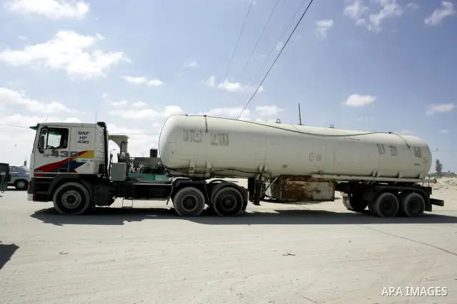 Trucks carrying goods and food supplies arrive in Rafah town in the southern Gaza Strip on September 20, 2011, after they crossed the Kerem Shalom terminal from Israel. The Palestinians are preparing to submit a formal r...