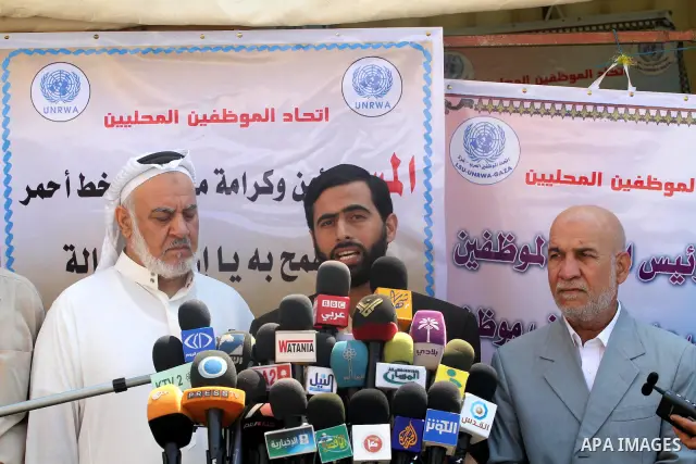 Member of the Palestinian mass change and reform delivers speech in a press conference in front of the UNRWA headquarters in Gaza city on Sep. 21, 2011. Photo by Mohammed Asad