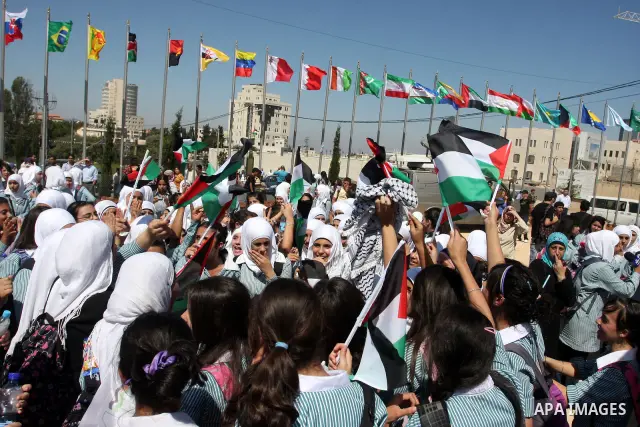 Palestinians school children participate a demonstration in support of the Palestinian bid for statehood recognition in the United Nations in the West Bank city of Ramallah, Thursday, Sept. 22, 2011. Palestinian proteste...