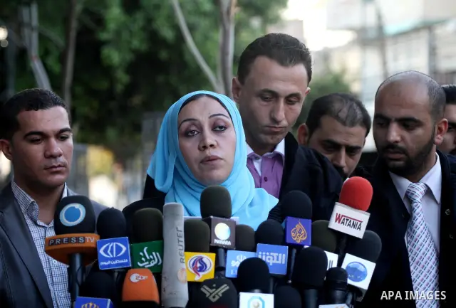 Palestinian lawyers take part in a press conference in support to President Mahmoud Abbas in Gaza city on Sep. 23,2011. Palestinian President Mahmoud Abbas is set to speak later Friday at the U.N., and plans to call on t...