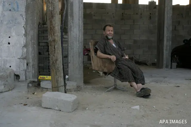 A Palestinian man sits outside his house in Rafah refugee camp, southern Gaza Strip on Sep. 24, 2011. Palestinian Authority President Mahmoud Abbas, hands over a formal letter to be admitted as a state to the UN Secretar...