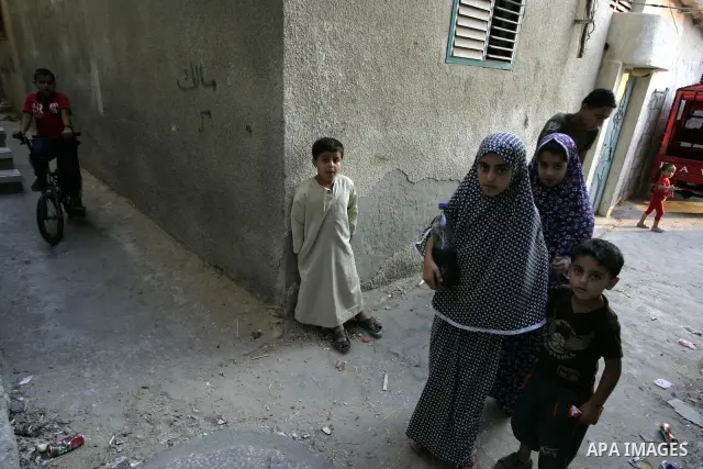 Palestinian children stand outside their houses in Rafah refugee camp, southern Gaza Strip on Sep. 24, 2011. Palestinian Authority President Mahmoud Abbas, hands over a formal letter to be admitted as a state to the UN S...