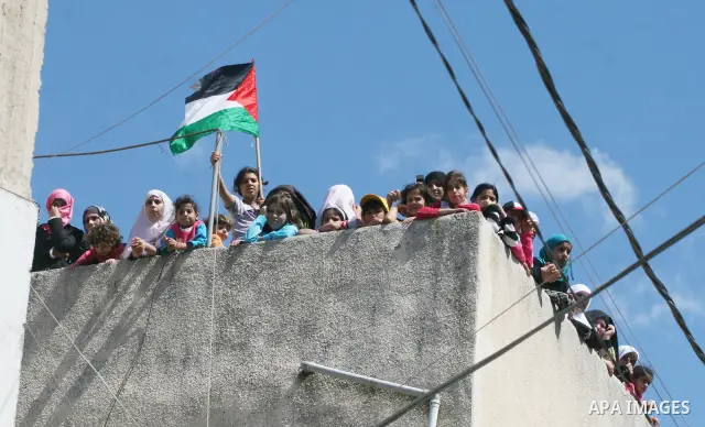 Palestinian women mourn during the funeral of Issam Badran in the West Bank village of Qusra near Nablus, Saturday, Sept. 24, 2011. Badran was shot dead Friday during a clash with Israeli soldiers and settlers. The shoot...