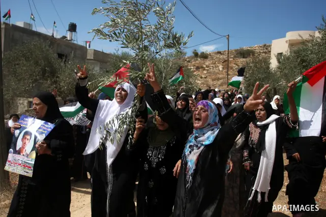 Palestinian women mourn during the funeral of Issam Badran in the West Bank village of Qusra near Nablus, on Sept. 24, 2011. Badran was shot dead Friday during a clash with Israeli soldiers and settlers. The shooting cam...