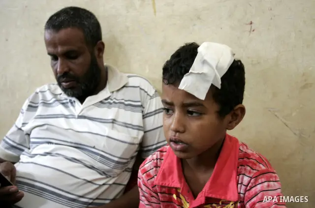 A Palestinian student, Bashir Ghaydah was injured in his head while playing in a school grounds of the Relief and Works Agency refugees "UNRWA" in Rafah, southern Gaza Strip on Sep. 25, 2011. UNRWA refuses to provide tre...