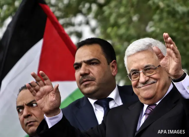 Palestinian President Mahmoud Abbas (Abo Mazen) addresses the crowd during a celebration in the West Bank city of Ramallah upon his return from the U.N. General Assembly in the U.S., on Sept. 25, 2011. Palestinians want...
