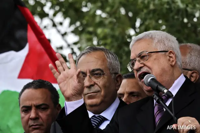 Palestinian President Mahmoud Abbas (Abo Mazen) addresses the crowd during a celebration in the West Bank city of Ramallah upon his return from the U.N. General Assembly in the U.S., on Sept. 25, 2011. Palestinians want...