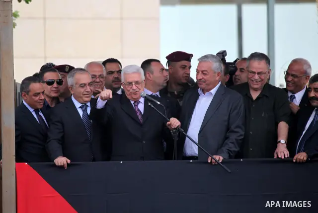Palestinian President Mahmoud Abbas (Abo Mazen) addresses the crowd during a celebration in the West Bank city of Ramallah upon his return from the U.N. General Assembly in the U.S., on Sept. 25, 2011. Palestinians want...